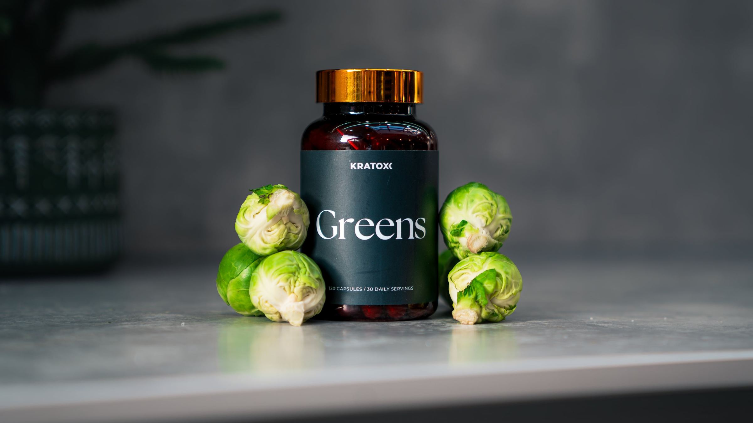 Greens product styled with fresh vegetables