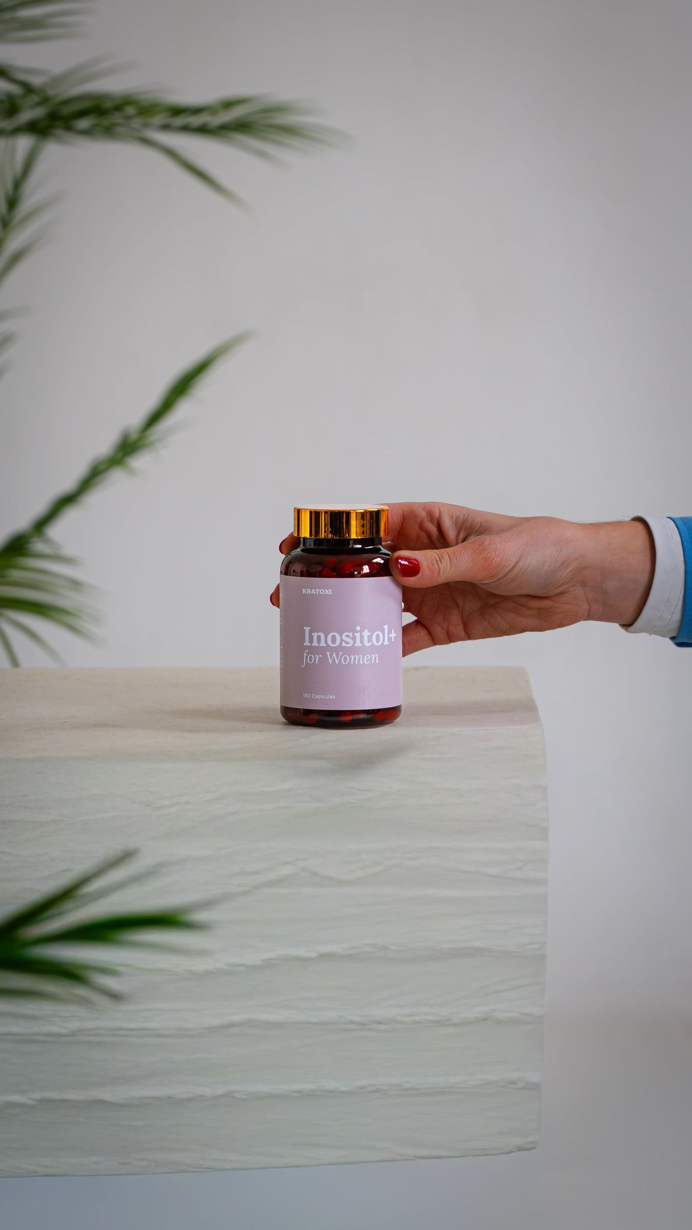 Pink AOB gummies in a clean studio setting
