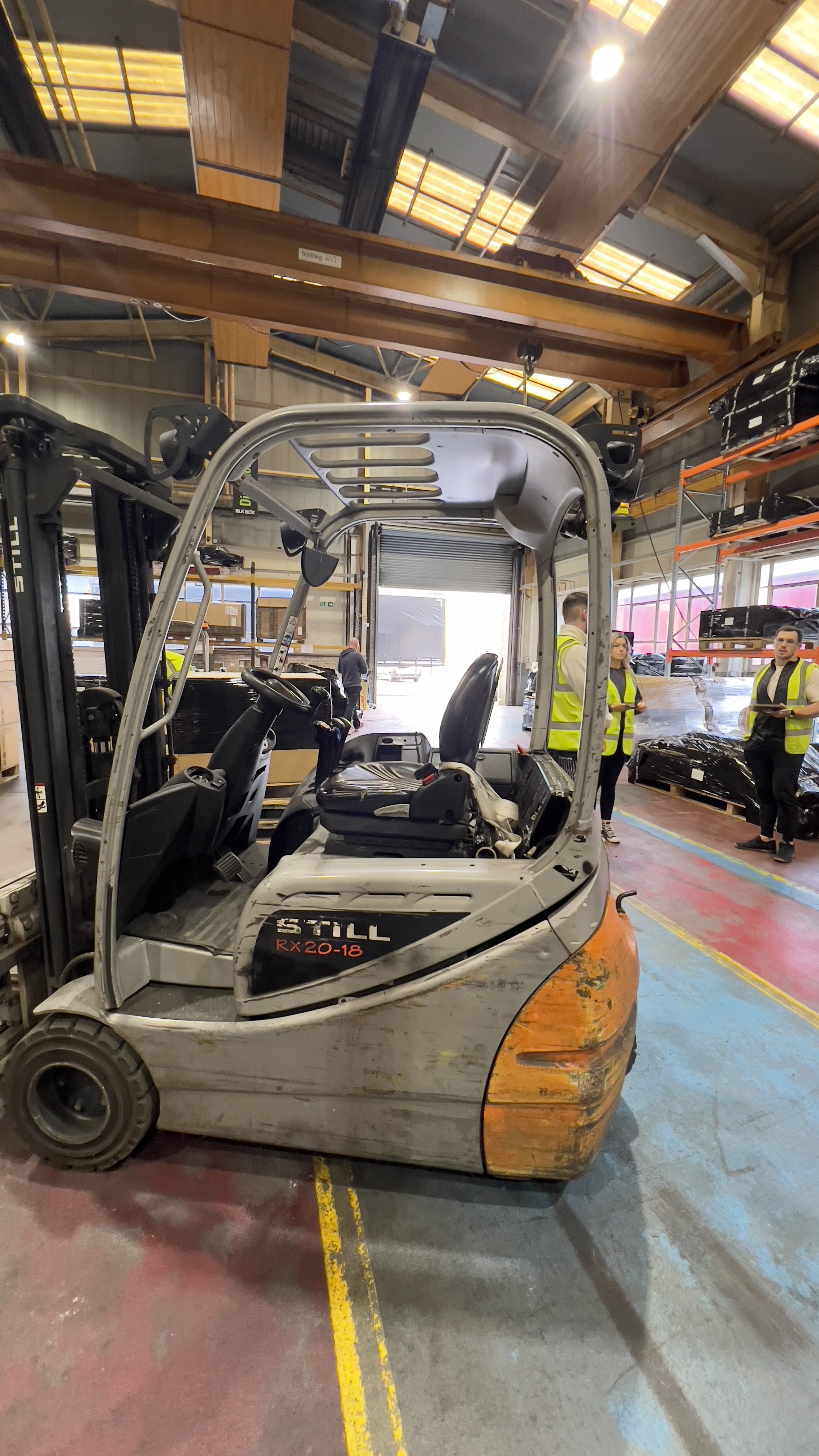 Crew preparations around the forklift