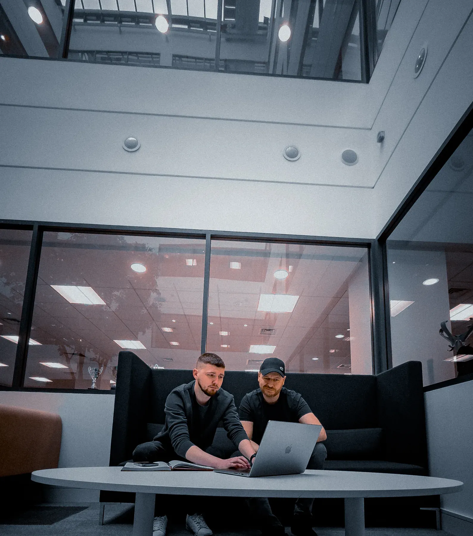Production monitor showing two interview participants