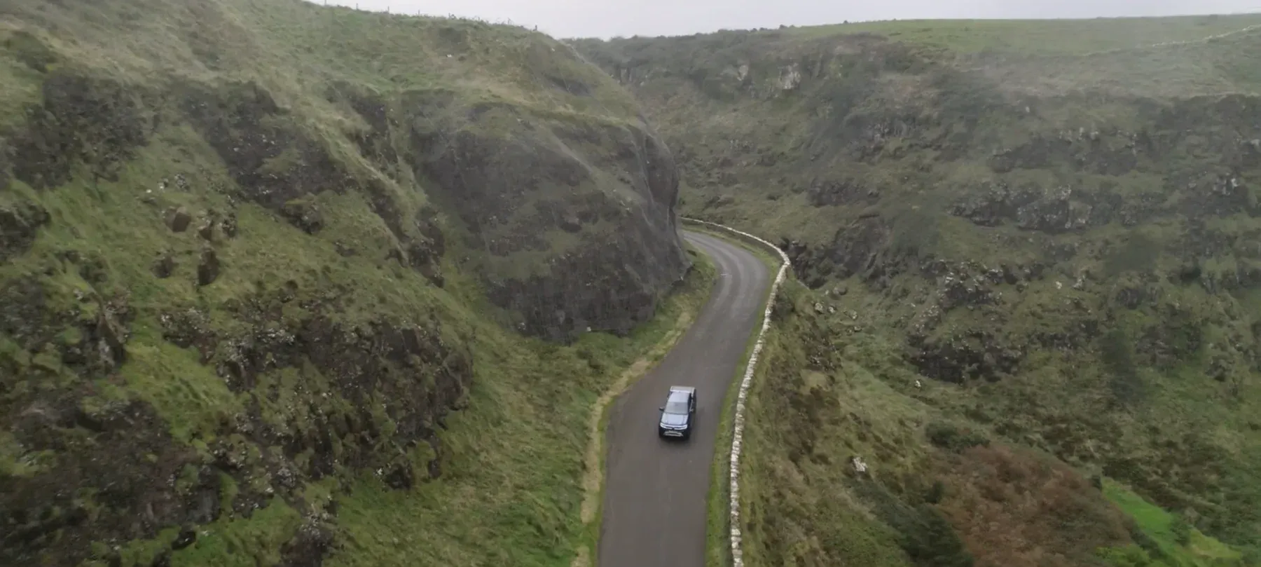 Aerial view of the Amarok on a winding road